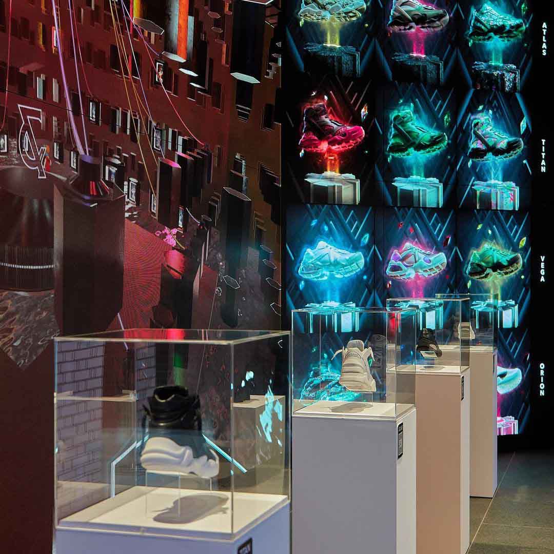 Trainers in display boxes inside the Cult & Rain experience