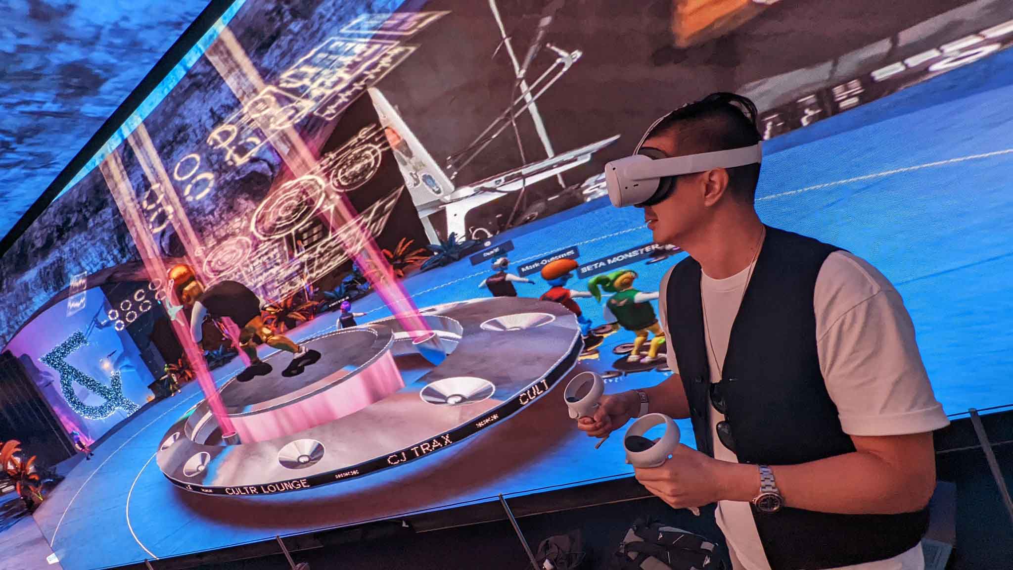 Visitor using a Virtual Reality headset in the Cult & Rain experience