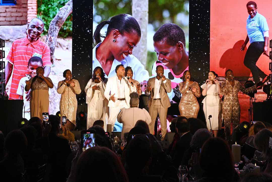 Singers on stage at the Mothers2mothers anniversary celebration