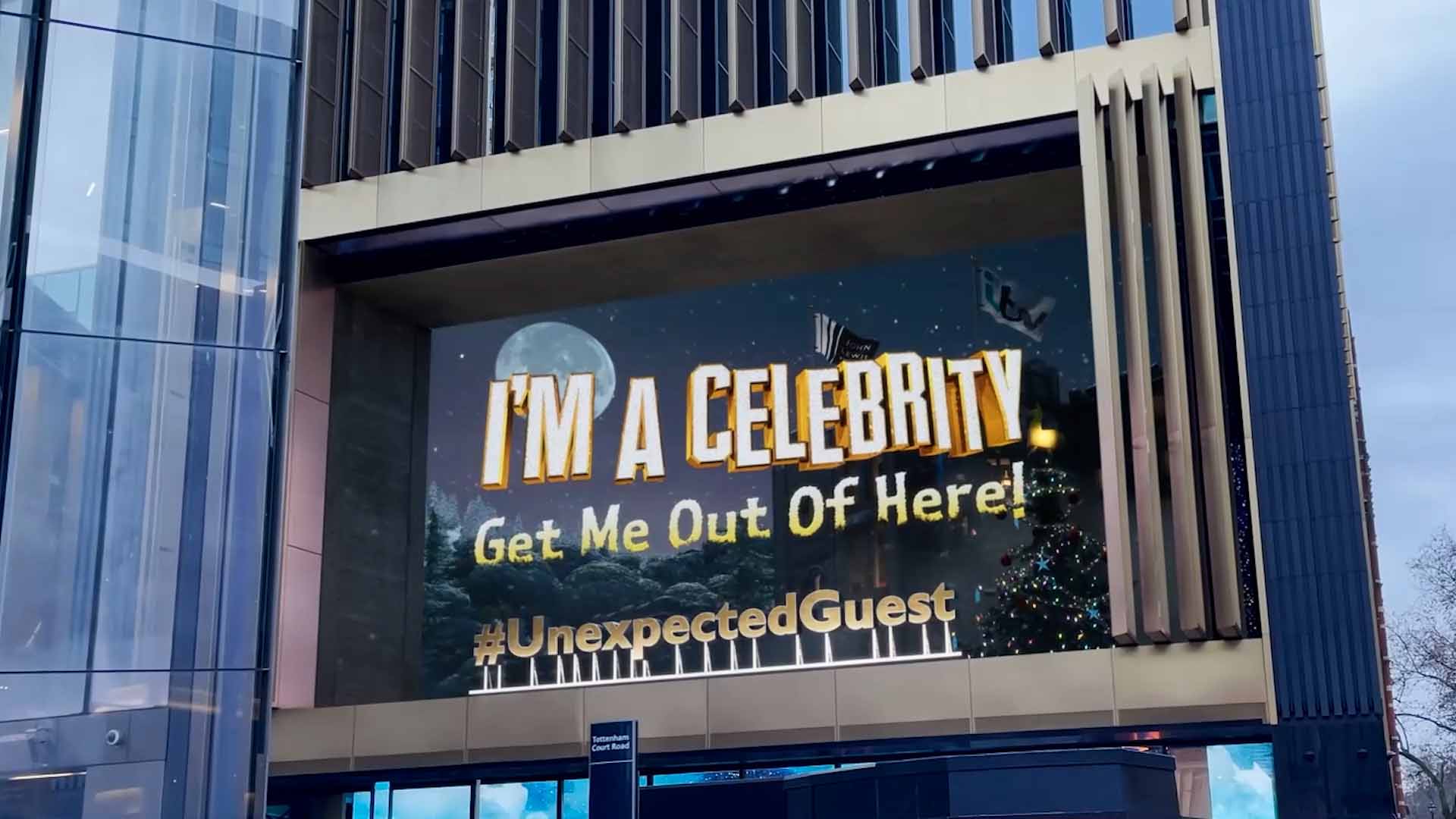 I'm A Celebrity Get Me Out Of Here promo on screen inside The Now Building