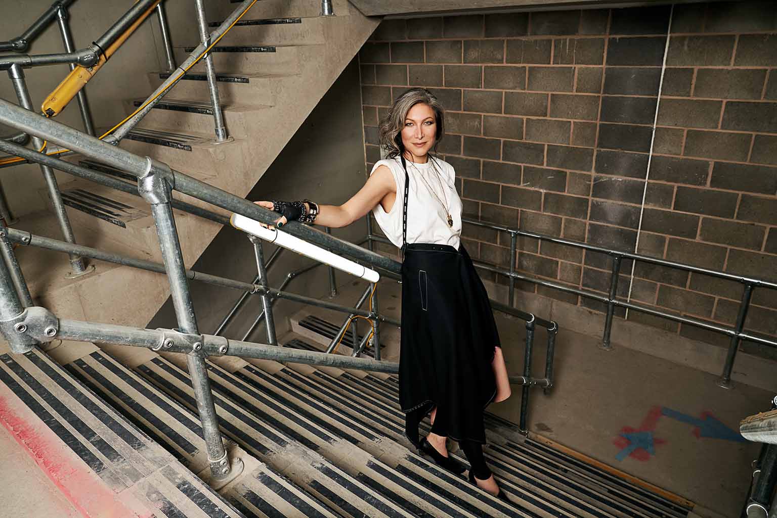 Karrie Goldberg standing in a stairwell